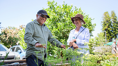 A man and a woman at a garden